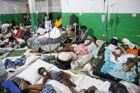 Patients in a crowded hospital ward in Haiti